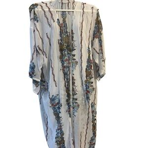 Beautiful and feline shear caftan style throw